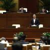 Bộ trưởng Bộ Thông tin và Truyền thông Nguyễn Mạnh Hùng giải trình, làm rõ một số vấn đề đại biểu Quốc hội nêu. (Ảnh: An Đăng/TTXVN)