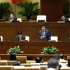 Bộ trưởng Bộ Kế hoạch và Đầu tư Nguyễn Chí Dũng phát biểu giải trình, làm rõ một số vấn đề đại biểu Quốc hội nêu. (Ảnh: An Đăng/TTXVN)