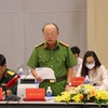 Đại tá Trần Văn Chính, Phó Giám đốc Công an tỉnh Bình Dương cung cấp thông tin tại buổi họp báo. (Ảnh: Chí Tưởng/TTXVN)
