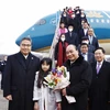 [Photo] Chủ tịch nước Nguyễn Xuân Phúc tới Hàn Quốc