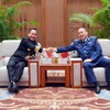 Thiếu tướng Lê Quang Đạo, Tư lệnh Cảnh sát biển Việt Nam và Phó Đô đốc Aan Kurnia, Tư lệnh Cảnh sát biển Indonesia tại buổi gặp gỡ, trao đổi. (Nguồn: Cảnh sát biển Việt Nam)