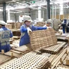 Sản phẩm đồ gỗ xuất khẩu sang Thụy Sỹ tại nhà máy của Công ty Cổ phần Woodsland Tuyên Quang. (Ảnh: TTXVN)