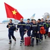 Đội tìm kiếm cứu nạn và cứu hộ Bộ Công an hoàn thành nhiệm vụ tại Thổ Nhĩ Kỳ, về đến sân bay quốc tế Nội Bài. (Ảnh: Phạm Kiên/TTXVN)