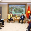 Phó Thủ tướng Trần Hồng Hà tiếp bà Rana Flowers, Trưởng Đại diện Quỹ Nhi đồng Liên hợp quốc tại Việt Nam. (Ảnh: Văn Điệp/TTXVN)