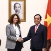 Phó Thủ tướng Trần Lưu Quang tiếp bà Carolyn Turk, Giám đốc Quốc gia Ngân hàng Thế giới (WB) tại Việt Nam. (Ảnh: Lâm Khánh/TTXVN)