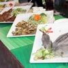 Các món ngon đặc sản Việt được trình bày công phu tại Lễ hội văn hóa ẩm thực, món ngon Saigontourist Group 2023. (Ảnh: Mỹ Phương/TTXVN)