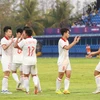 Các cầu thủ U22 Việt Nam ăn mừng bàn thắng nâng tỷ số lên 3-0 trong trận đấu với U22 Singapore. (Ảnh: Huỳnh Thảo/TTXVN)
