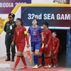 Huỳnh Như đeo băng đội trưởng trong trận ra quân của tuyển nữ Việt Nam gặp tuyển nữ Malaysia tại SEA Games 32. (Ảnh: Minh Quyết/TTXVN)