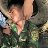 Đối tượng Lường Văn Quân, hộ khẩu thường trú ở xã Bum Tở, huyện Mường Tè, bị lực lượng chức năng bắt giữ. (Ảnh: TTXVN phát)