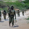 Binh sỹ Uganda thuộc Lực lượng gìn giữ hòa bình Liên hợp quốc ở châu Phi tuần tra tại Merka, Somalia. (Ảnh: AFP/TTXVN)