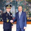 Bộ trưởng Bộ Công an Việt Nam Tô Lâm và Tư lệnh Cảnh sát Quốc gia Hàn Quốc Yoon Hee Keun. (Nguồn: Báo Công an Nhân dân)