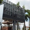 Công trình bảng quảng cáo “khủng” không phép nằm một phần trong khu vực bảo vệ 1 của di tích Tháp chuông Thành cổ Quảng Trị. (Ảnh: Nguyên Lý/TTXVN)