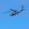 Một máy bay trực thăng của Hải quân Australia tiến hành các hoạt động tìm kiếm và cứu nạn ở khu vực lân cận Đảo Lindeman, Queensland, ngày 29/7. (Nguồn: AFP) 