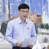 Chủ nhiệm Ủy ban Kinh tế của Quốc hội Vũ Hồng Thanh trình bày báo cáo. (Ảnh: Doãn/TTXVN)