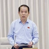 Chủ nhiệm Ủy ban Pháp luật của Quốc hội Hoàng Thanh Tùng trình bày báo cáo. (Ảnh: Doãn Tấn/TTXVN)