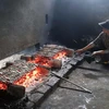[Photo] Độc đáo nghề nướng cá biển truyền thống nơi “miền chân sóng” 