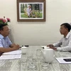 Ông Lê Huyền, Phó Chủ tịch UBND tỉnh Ninh Thuận phản hồi thông tin với phóng viên TTXVN về dự án Khu nghỉ dưỡng cao cấp Vĩnh Hy. (Ảnh: TTXVN phát)