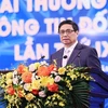 Thủ tướng Phạm Minh Chính phát biểu tại Lễ trao Giải thưởng toàn quốc về thông tin đối ngoại lần thứ IX. (Ảnh: Dương Giang/TTXVN)