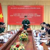 Đại tá Huỳnh Văn Đông, Chính ủy Bộ đội Biên phòng tỉnh Kiên Giang, phát biểu trong một buổi làm việc. (Ảnh: Hồng Đạt/TTXVN)