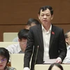 Đại biểu Quốc hội TP Hồ Chí Minh Nguyễn Tri Thức phát biểu ý kiến. (Ảnh: Doãn Tấn/TTXVN)
