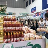 Nhiều nhãn hàng gia vị có thương hiệu đã lên kệ siêu thị phục vụ thị trường Lễ, Tết Gáp Thìn 2024. (Ảnh: Mỹ Phương/TTXVN)