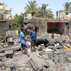 Những ngôi nhà bị phá hủy sau cuộc không kích của Israel xuống thị trấn Beit Hanoun, Dải Gaza. (Ảnh: THX/TTXVN)