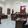 Hội đồng xét xử vụ án cựu Trưởng Công an quận Đồ Sơn và đồng phạm. (Ảnh: Minh Thu/TTXVN)