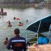 Lực lượng cứu hộ tìm kiếm nạn nhân sau vụ lật thuyền ở bang Gujarat, miền Tây Ấn Độ ngày 18/1. (Ảnh: AFP/TTXVN)
