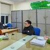 Đối tượng Phạm Thị Hòa, cựu Chủ tịch Hội đồng quản trị Công ty Cổ phần Tập đoàn Sen Tài Thu, tại cơ quan Công an. (Ảnh: TTXVN phát)