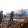 Binh sỹ Israel tiến hành chiến dịch quân sự tại Dải Gaza ngày 23/1 vừa qua. (Ảnh: AFP/TTXVN)