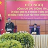 Đại tướng Tô Lâm, Bộ trưởng Bộ Công an và Bí thư Tỉnh ủy Lào Cai Đặng Xuân Phong chủ trì buổi làm việc. (Ảnh: TTXVN phát)