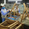 Sản phẩm đồ gỗ nội, ngoại thất của Công ty được xuất khẩu sang thị trường Mỹ, Canada, Châu Âu, Nga và Nhật Bản. (Ảnh: Vũ Sinh/TTXVN)