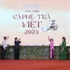 Đại biểu thực hiện nghi thức khai mạc Lễ hội tôn vinh càphê-trà Việt 2024. (Ảnh: Xuân Anh/TTXVN)