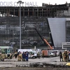 Hiện trường vụ tấn công khủng bố tại nhà hát Crocus City Hall ở Moskva, Nga, ngày 26/3 vừa qua. (Ảnh: AFP/TTXVN)