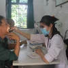Người dân được thăm khám, kiểm tra sức khỏe tại trạm y tế xã Tam Quan, huyện Tam Đảo, tỉnh Vĩnh Phúc. (Ảnh: Nguyễn Thảo/TTXVN)