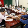 Các hộ nghèo, đối tượng chính sách vay vốn tại điểm giao dịch xã Canh Tân, huyện Hưng Hà, tỉnh Thái Bình. (Ảnh: Thế Duyệt/TTXVN)