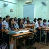 Học sinh Trường THCS Huỳnh Khương Ninh, quận 1. (Ảnh: Thu Hoài/TTXVN)