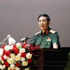 Đại tướng Phan Văn Giang, Bộ trưởng Quốc phòng phát biểu tại hội nghị tiếp xúc cử tri. (Ảnh: Thu Hằng/TTXVN)