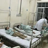 Hơn 70 bệnh nhân nghi ngộ độc đang được điều trị tại Bệnh viện đa khoa khu vực Long Khánh sau khi ăn bánh mỳ. (Ảnh: TTXVN phát)
