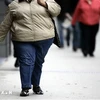 Một phụ nữ bị mắc bệnh béo phì. (Ảnh: AFP/TTXVN )