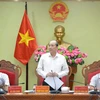 Ông Phạm Ngọc Nghị, Chủ tịch UBND tỉnh Đắk Lắk phát biểu tại cuộc họp. (Ảnh: Tuấn Anh-TTXVN)