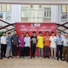 Đội tuyển Việt Nam dự thi Olympic Tin học Châu Á (APIO) 2024 cùng các giáo viên dẫn đoàn tham gia thi trực tuyến tại Trường Đại học Công nghệ-Đại học Quốc gia Hà Nội. (Ảnh: Bộ Giáo dục và Đào tạo/TTXVN phát)