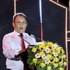 Chủ tịch UBND quận Hải Châu Lê Tự Gia Thạnh phát biểu khai trương phố đi bộ Bạch Đằng. (Ảnh: Trần Lê Lâm/TTXVN)
