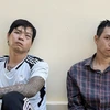 Hai anh em Sang và Oai (phải) bị bắt. (Ảnh: TTXVN phát)