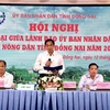 Lãnh đạo Ủy ban Nhân dân tỉnh Đồng Nai chủ trì buổi đối thoại với nông dân. (Ảnh: Lê Xuân/TTXVN)