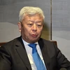 Chủ tịch Ngân hàng Đầu tư cơ sở hạ tầng châu Á (AIIB) Kim Lập Quần trả lời phỏng vấn. (Ảnh: Lê Phương/TTXVN)