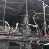 [Photo] Cháy cửa hàng khung nhôm thép trên đường Đê La Thành