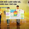 Đại diện trẻ em trình bày về phòng chống tai nạn thương tích cho trẻ em tại Diễn đàn trẻ em Quốc gia. (Ảnh: Nguyễn Thủy/TTXVN)