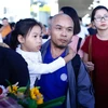 Thuyền viên Nguyễn Văn Xuân trở về sân bay Nội Bài ngày 25/10. (Ảnh: Minh Chiến/Vietnam+)