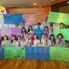 Các bạn sinh viên trong một hoạt động của Tháng hành động. (Ảnh: PV/Vietnam+)